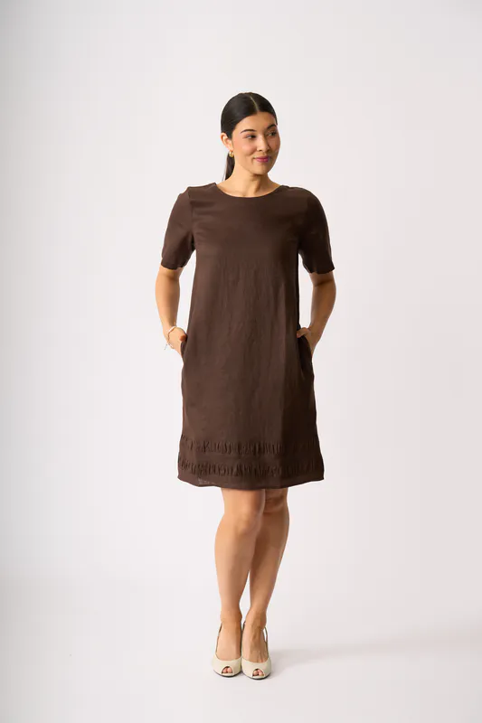 Model wearing Cocoa Crowd Pleaser Dress By Foil Available at Beetees Nelson