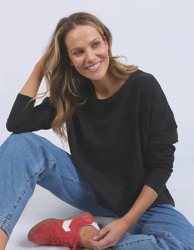 Model wearing Black Jayne Throw On Top By Foxwood Available at Beetees Nelson