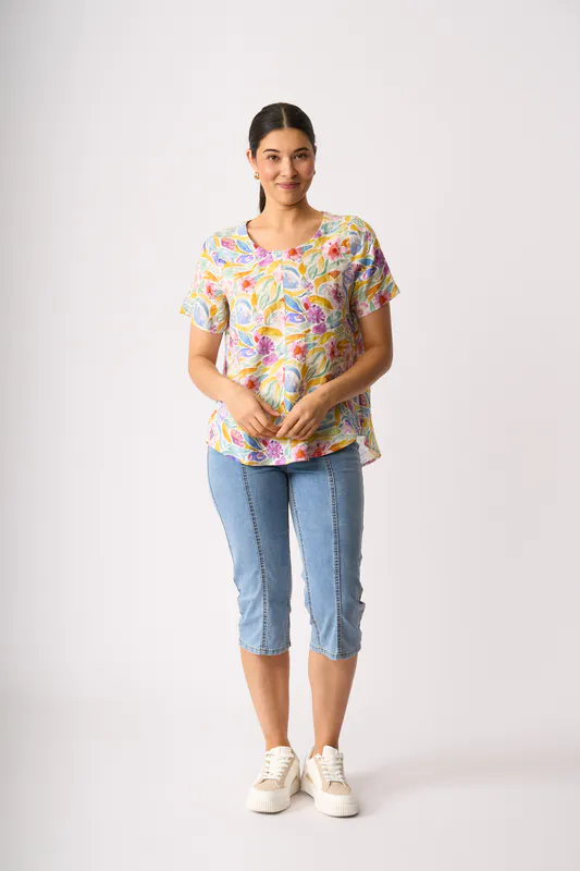 Model wearing Bright Blooms Top - Swing, Up Down Hem By Preen Available at Beetees Nelson