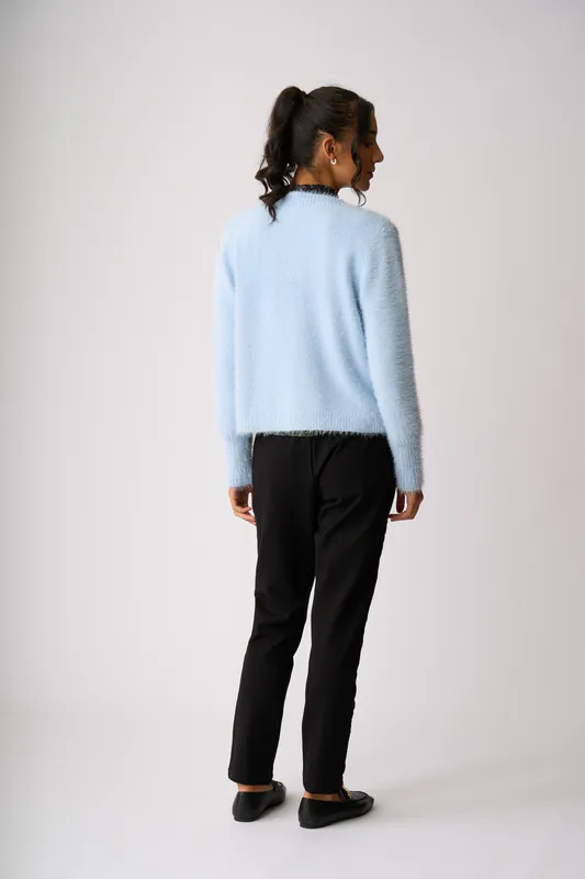 Model wearing Blue Fluffy Scoop Cardigan By Foil Available at Beetees Nelson