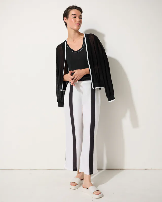 Model wearing Black Sporty Mesh Bomber By Marco Polo Available at Beetees Nelson