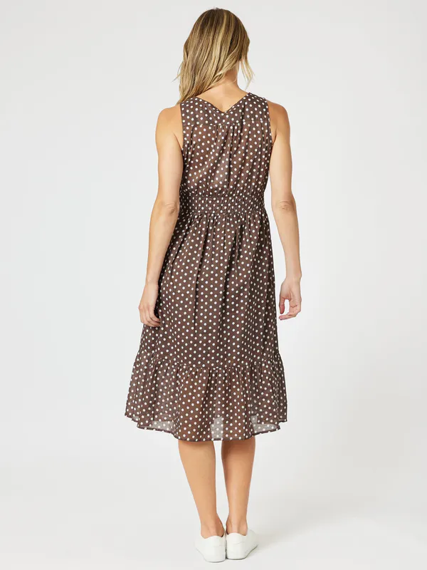 Model wearing Koko White Get Spotty Dress By Gordon Smith Available at Beetees Nelson