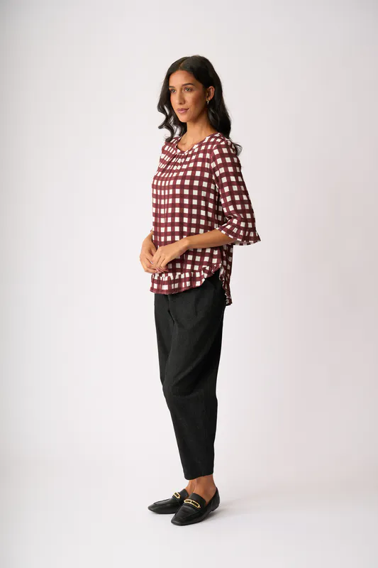 Model wearing Cocoa Check Gathered Scoop Hem Top By Foil Available at Beetees Nelson