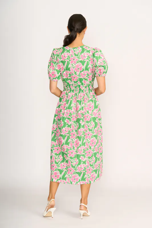 Model wearing Blossom Pop Dress - Shirred Empire Line By Foil Available at Beetees Nelson