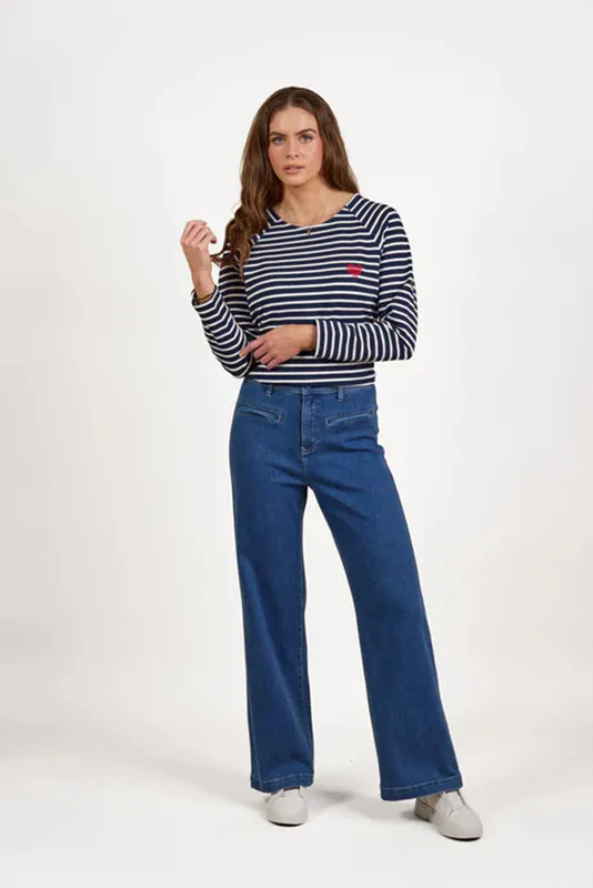 Model wearing Blue Wash Wide Leg Full Length Jean By Vassalli Available at Beetees Nelson