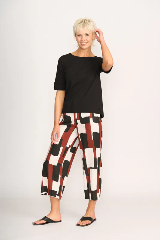 Model wearing Black Tee - Wide Neck, Elbow Sleeve By Esplanade Available at Beetees Nelson