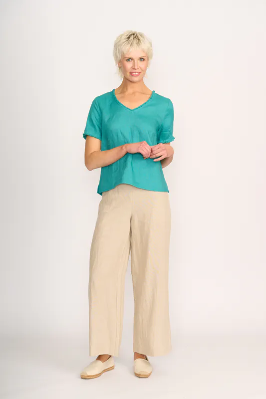 Model wearing Aquatic V Benefits Top By Foil Available at Beetees Nelson