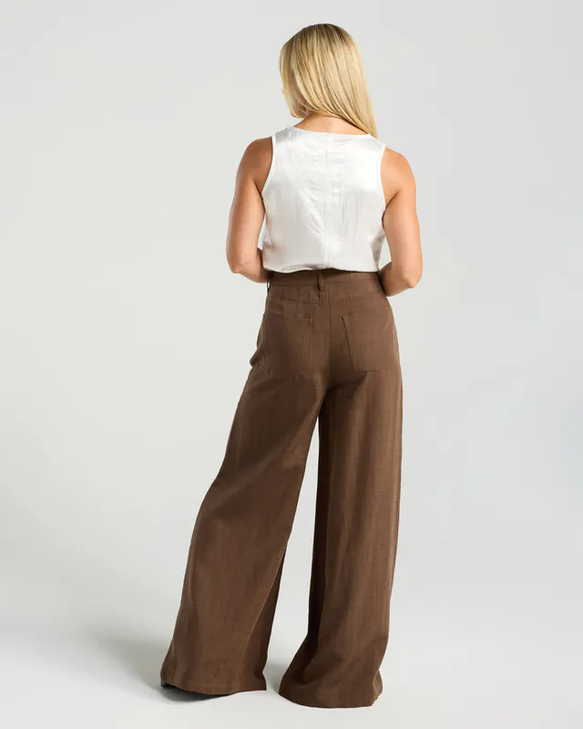 Model wearing Chocolate Leonora Palazzo Linen Pant By Blackstone Available at Beetees Nelson