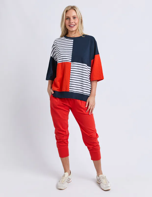 Model wearing Navy/Tangello Fig Sweat By Elm Available at Beetees Nelson