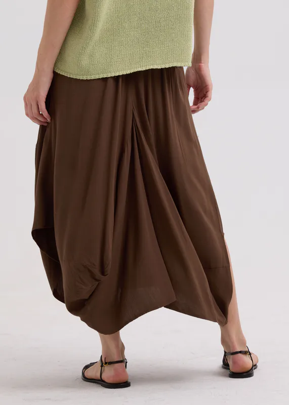 Model wearing Cocoa Drape Bottom Skirt By LD + CO Available at Beetees Nelson