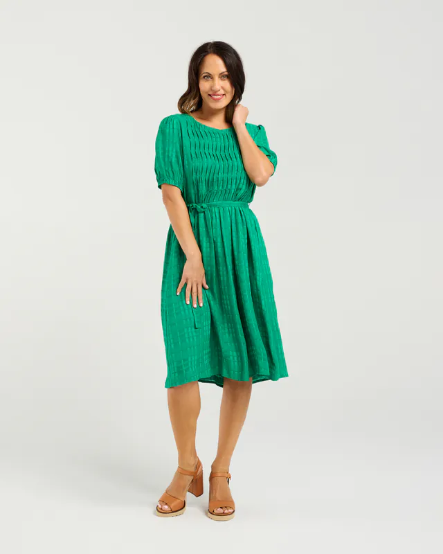Model wearing Green Joana Dress By Seduce Available at Beetees Nelson