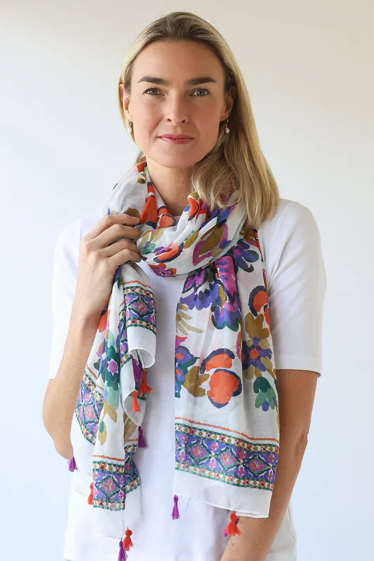 Model wearing Multi Lightweight Large Flower Print Scarf with Tassells By Archer House Available at Beetees Nelson