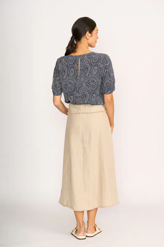 Model wearing Midnight Stars Podium Top By Foil Available at Beetees Nelson