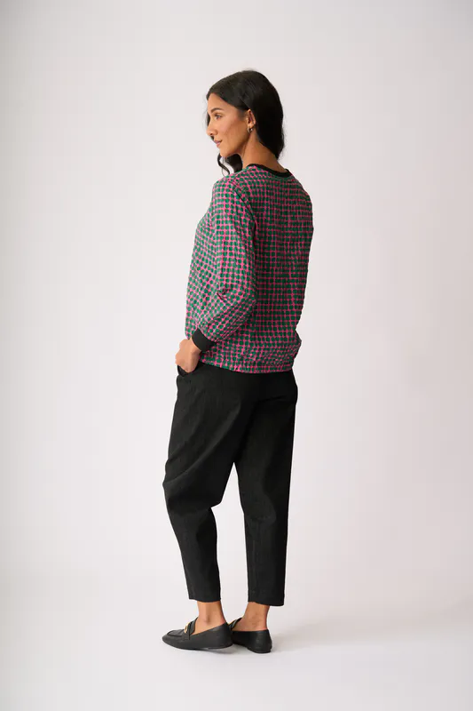 Model wearing Pink Spot Elastic Hem Detail Top By Memo Available at Beetees Nelson