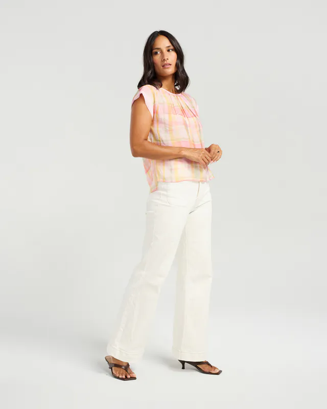 Model wearing Sunset Blush Sallie Top By NMBR Rose Available at Beetees Nelson