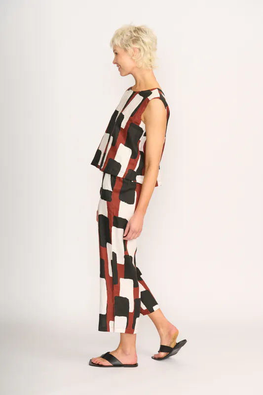 Model wearing Spice Box Top - Sleeveless, Pleat Back By Foil Available at Beetees Nelson