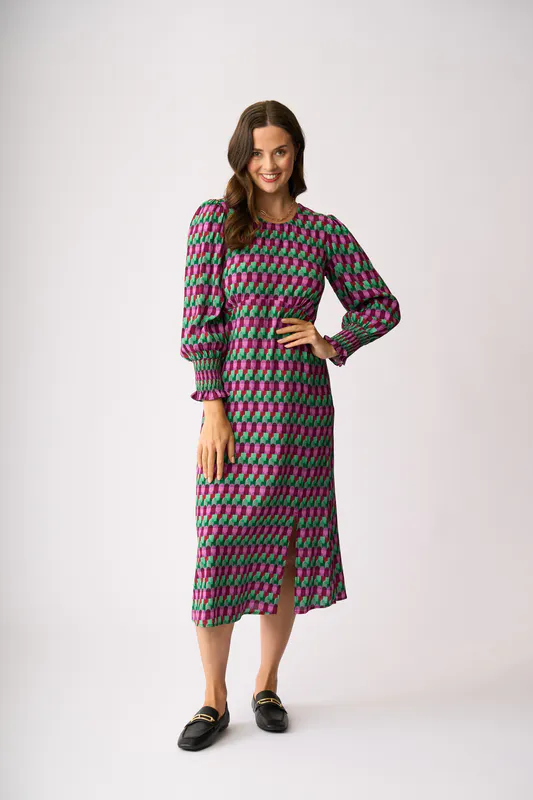 Model wearing Art Deco Curved & Shirred Dress By Foil Available at Beetees Nelson