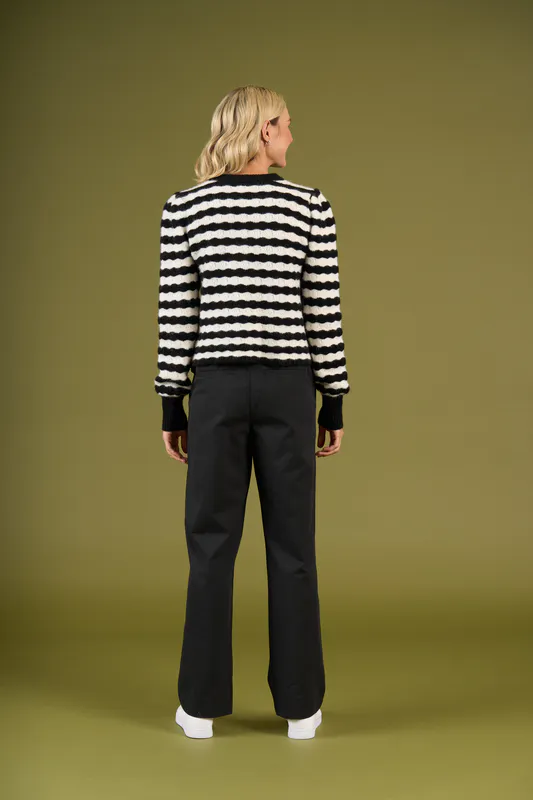 Model wearing Mono Stripe Grassmere Knit By Charlie Jane Available at Beetees Nelson