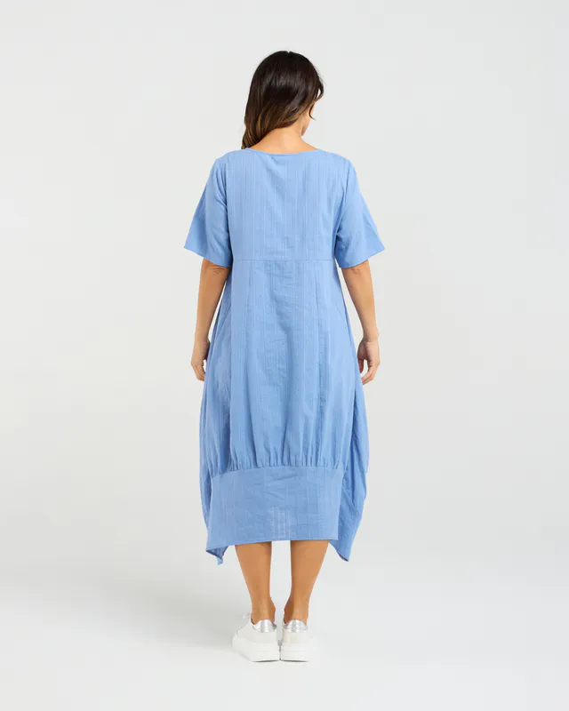 Model wearing Blue Selena Dress By Seduce Available at Beetees Nelson