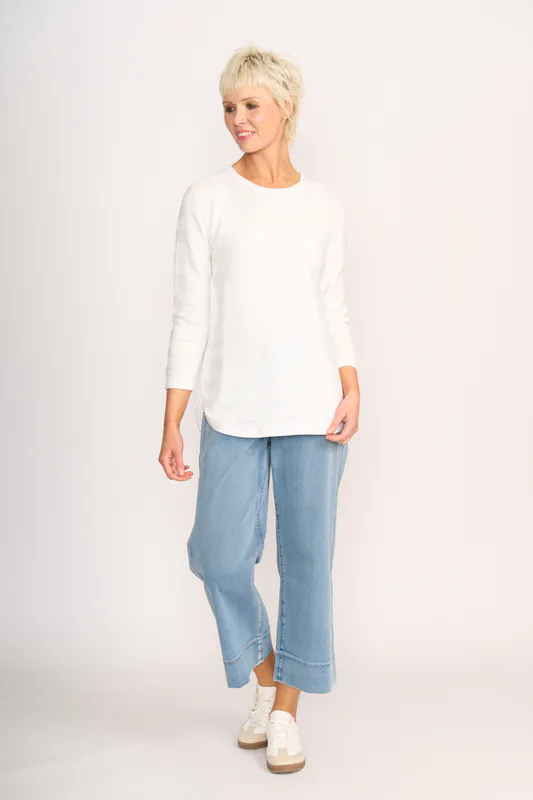Model wearing White Jumper - Stripe Scoop By Foil Available at Beetees Nelson