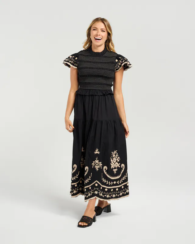 Model wearing Black Mia Dress By NMBR Rose Available at Beetees Nelson