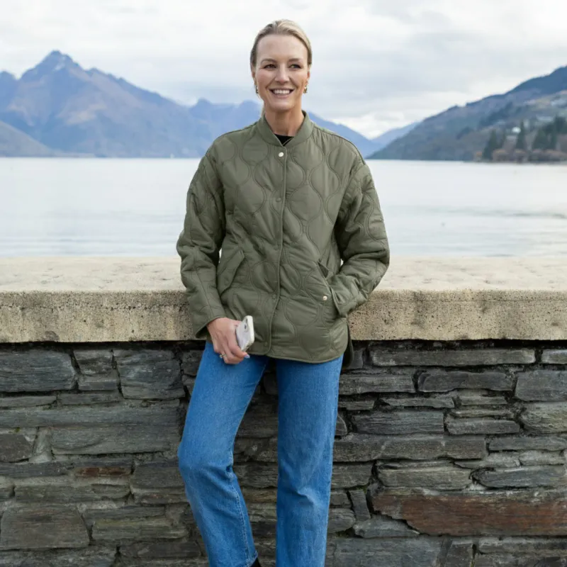 Model wearing Olive Green Talei Quilted Bomber Jacket By Moke Available at Beetees Nelson