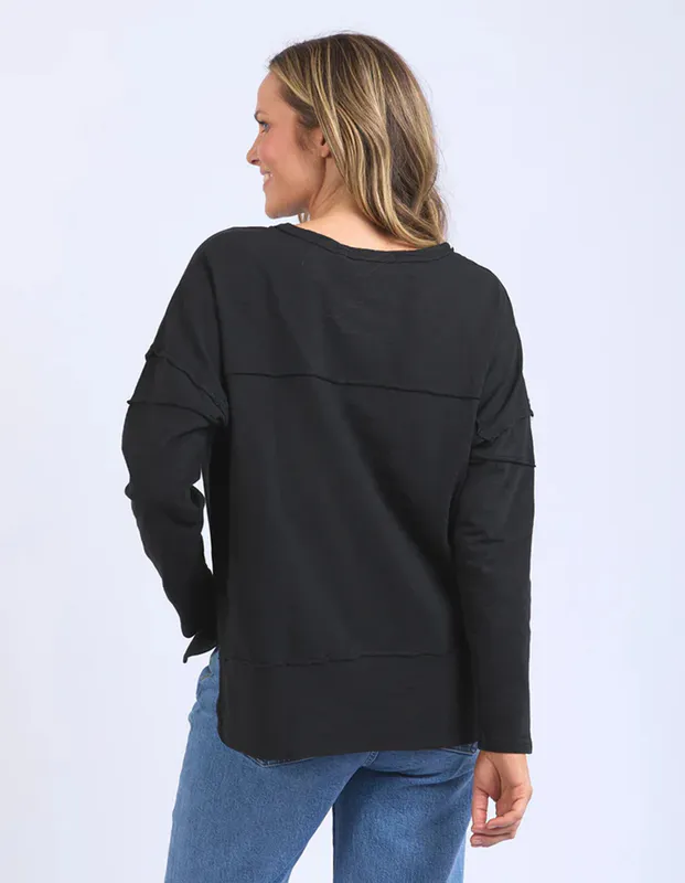 Model wearing Black Jayne Throw On Top By Foxwood Available at Beetees Nelson