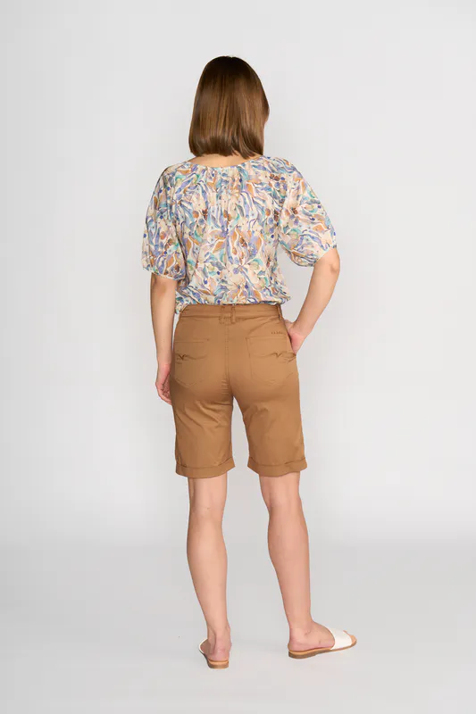 Model wearing Pecan Slim Leg Above Knee Short By Vassalli Available at Beetees Nelson