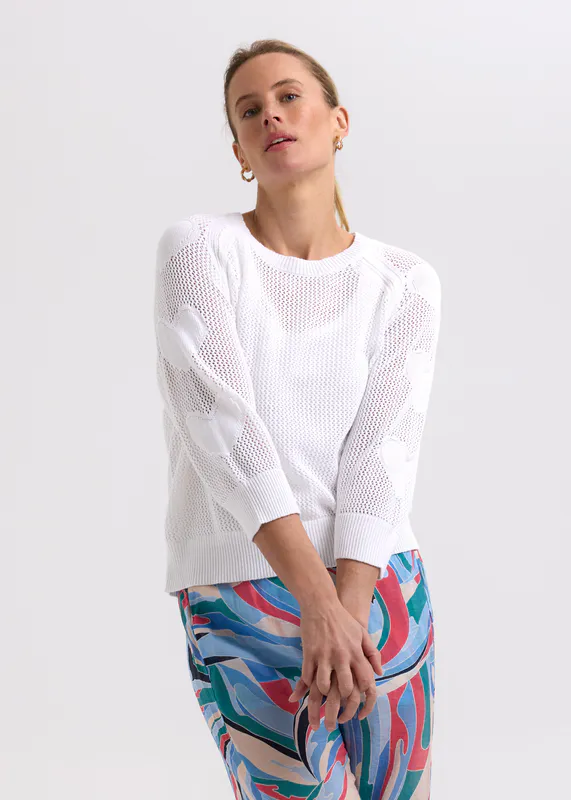 Model wearing white Heats on My Sleeve Jumper By Zaket & Plover Available at Beetees Nelson