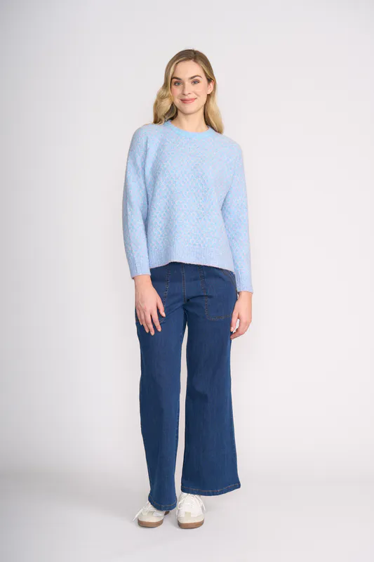 Model wearing Blue Honeycomb Sweetest Thing Sweater By Foil Available at Beetees Nelson