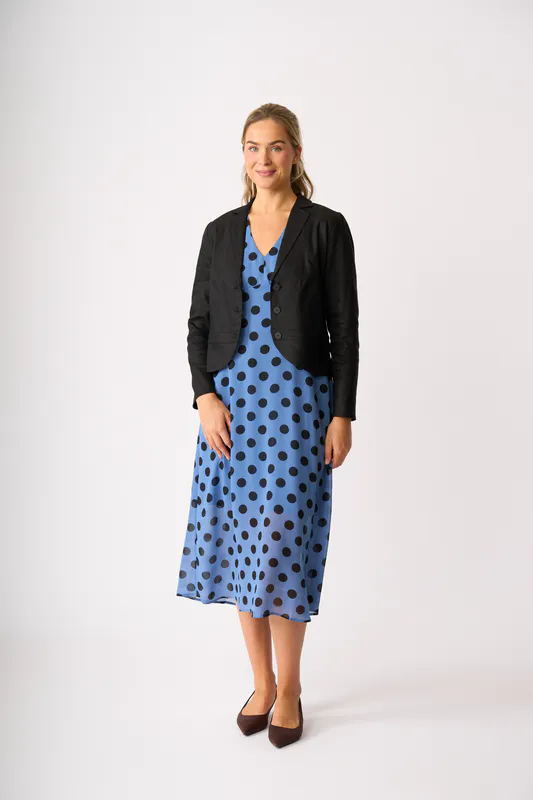 Model wearing Black Jacket - Scoop Hem Back By Oh Three Available at Beetees Nelson