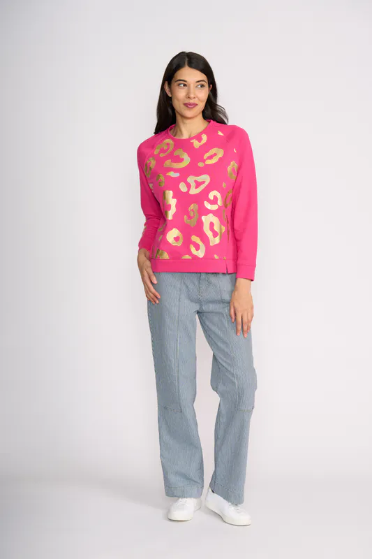 Model wearing Electric Fuchsia Notch Detail Sweatshirt By Foil Available at Beetees Nelson