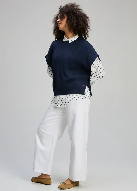 Model wearing Dark Denim Sleeveless Crew Essential By Zaket & Plover Available at Beetees Nelson