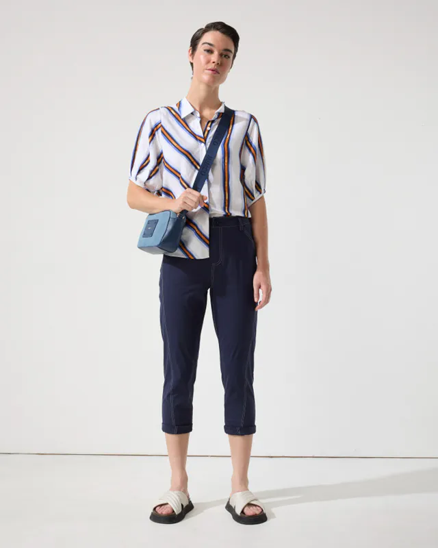 Model wearing Ink Essential Slim Pant By Marco Polo Available at Beetees Nelson