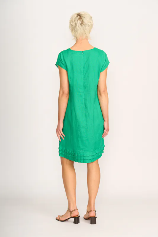 Model wearing green Dress - Pleat Dreams By Foil Available at Beetees Nelson