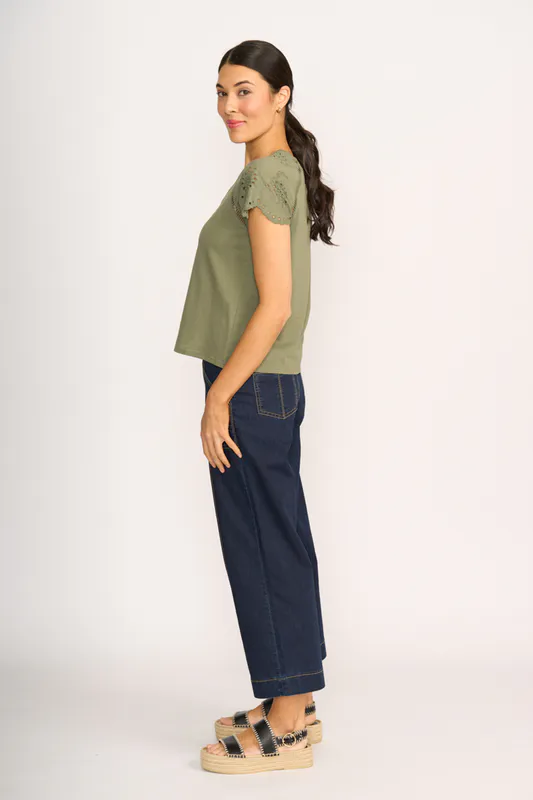 Model wearing Sage T-Shirt - Broderie Sleeve By Memo Available at Beetees Nelson