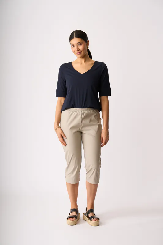 Model wearing Black V Neck Elbow Sleeve Top By Esplanade Available at Beetees Nelson