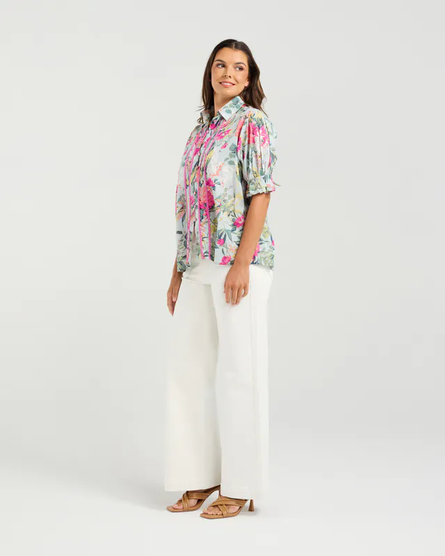 Model wearing Azealea Flower Bossa Top By NMBR Rose Available at Beetees Nelson