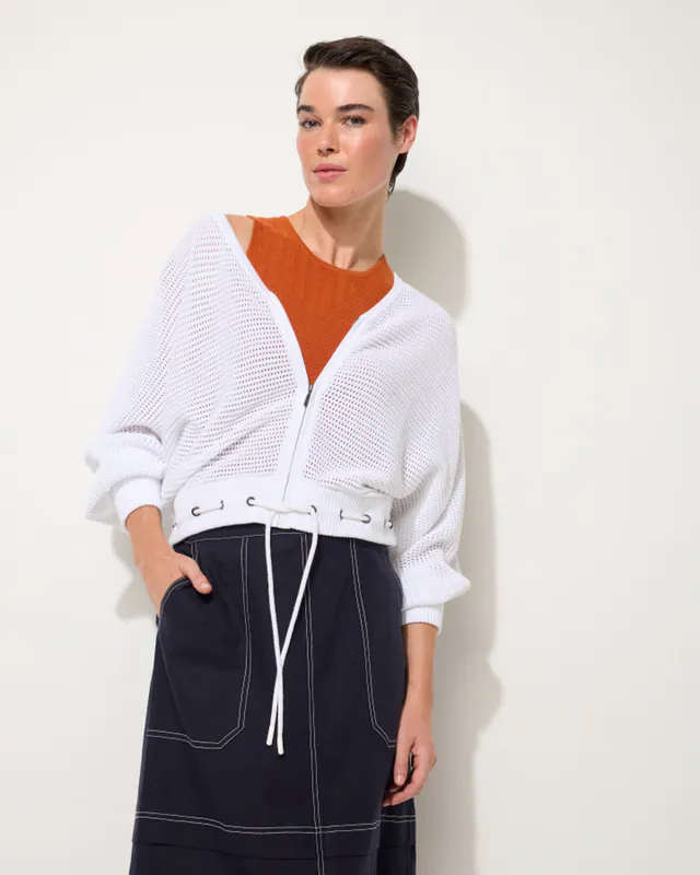 Model wearing White Open Knit Bomber By Marco Polo Available at Beetees Nelson