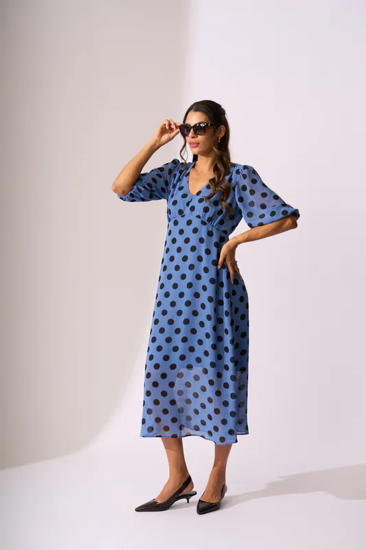 Model wearing Bluebell Spot V Neck Features Dress By Memo Available at Beetees Nelson