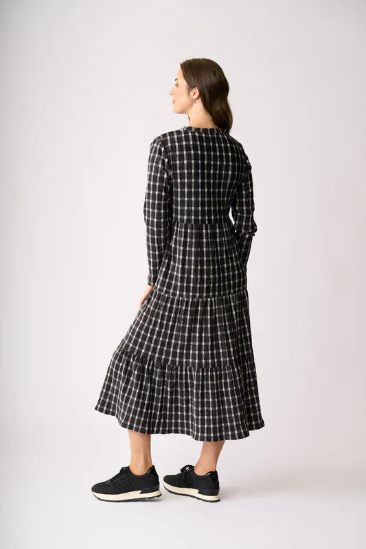 Model wearing Check Velveteen Dress By Memo Available at Beetees Nelson