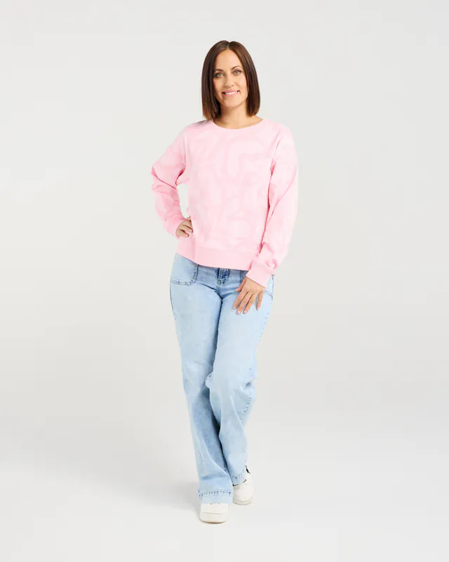 Model wearing Pink Heart Verona Jumper By Zafina Available at Beetees Nelson
