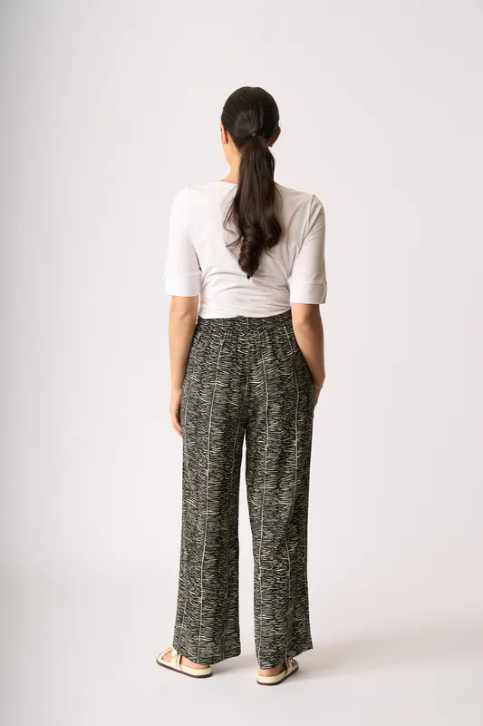 Model wearing Zebra Pull On Straight Trouser By Foil Available at Beetees Nelson