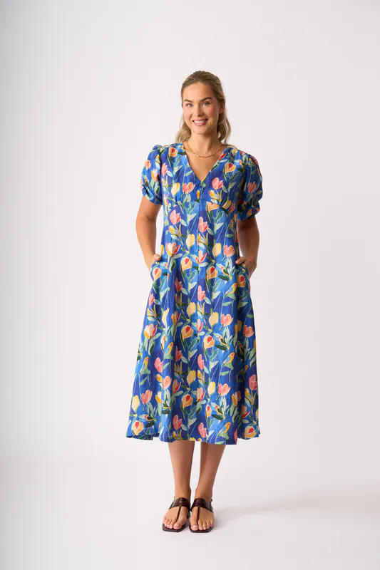 Model wearing Tropical Retreat Empire-Ly Yours Dress By Foil Available at Beetees Nelson