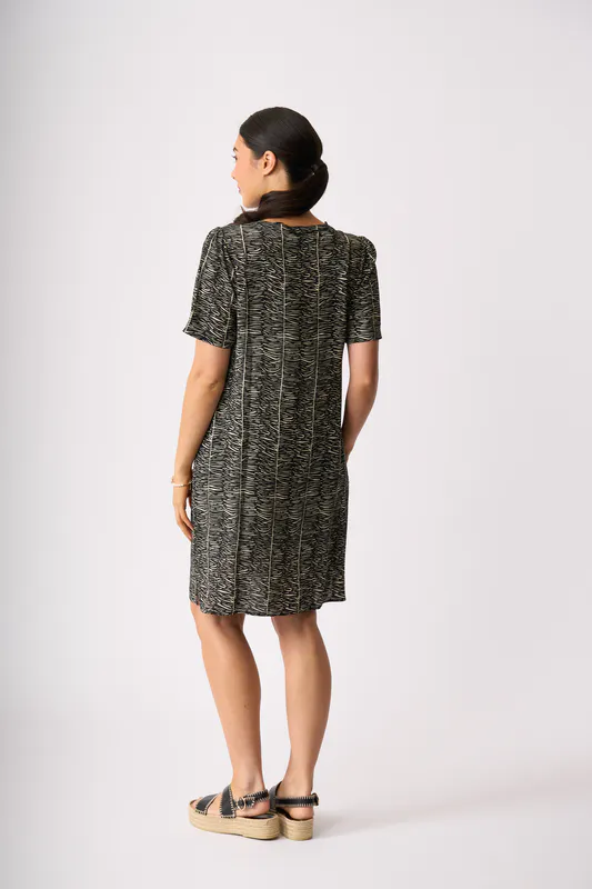 Model wearing Zebra In The Spotlight Dress By Foil Available at Beetees Nelson