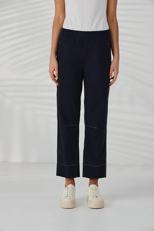 Model wearing Navy Trader Pant By Lania Available at Beetees Nelson