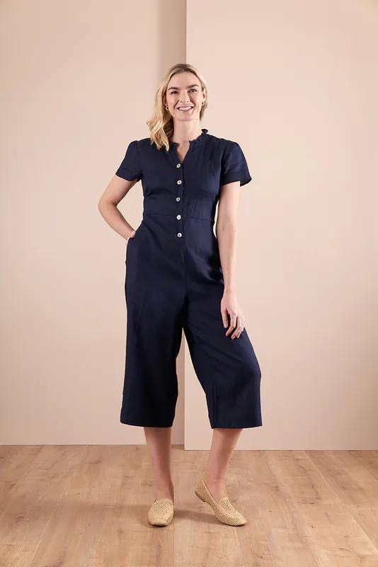 Front View of Midnight Coloured Jumpsuit - Ruffle Neck By Oh Three Available at Beetees Nelson