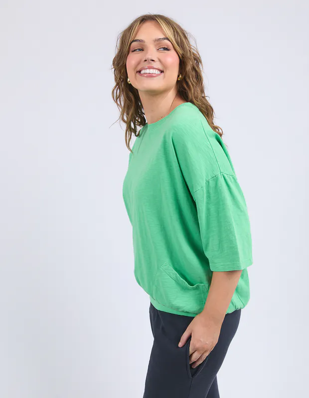 Model wearing Spring Green Maize Sweat By Elm Available at Beetees Nelson