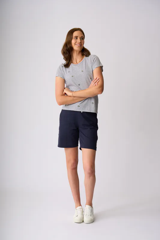 Model wearing Surfs Up Sumner Printed Tee By Charlie Jane Available at Beetees Nelson