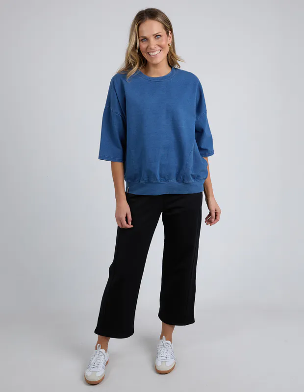 Model wearing Blue Mazie Sweat - Denim Look By Elm Available at Beetees Nelson